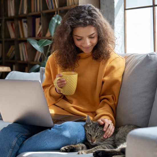 Happy,Relaxed,Hispanic,Teen,Girl,Student,Or,Freelancer,Relaxing,Sitting